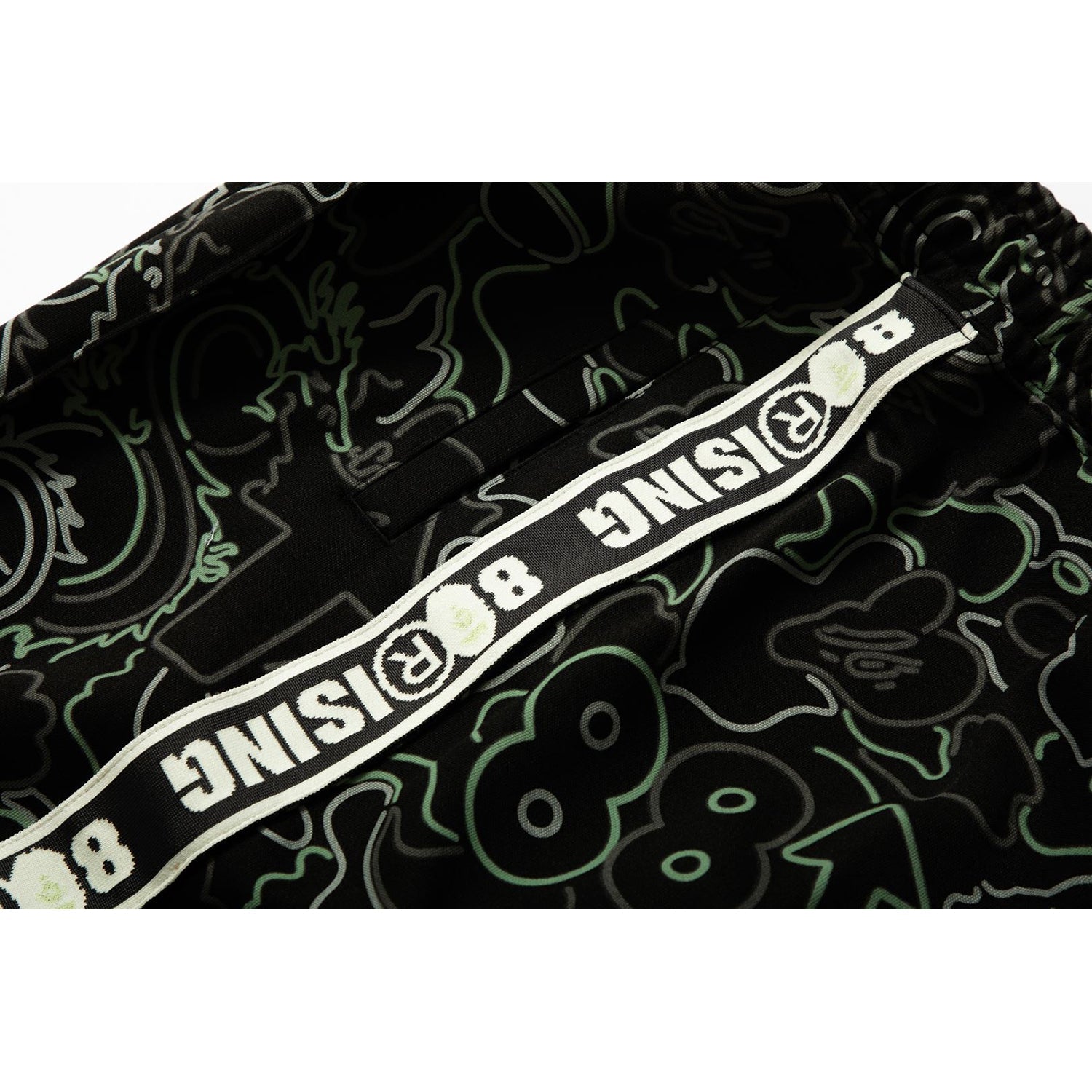 BAPE X 88RISING GLOW IN THE DARK CAMO TRACK PANTS MENS